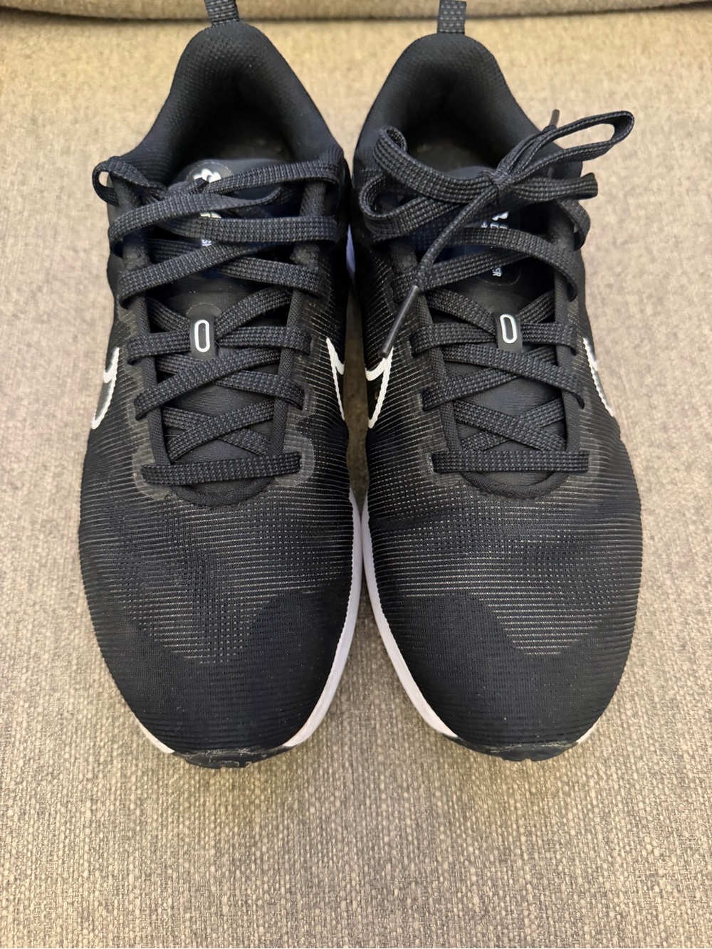 Nike Women’s Black Athletic Sneakers with White Swoosh